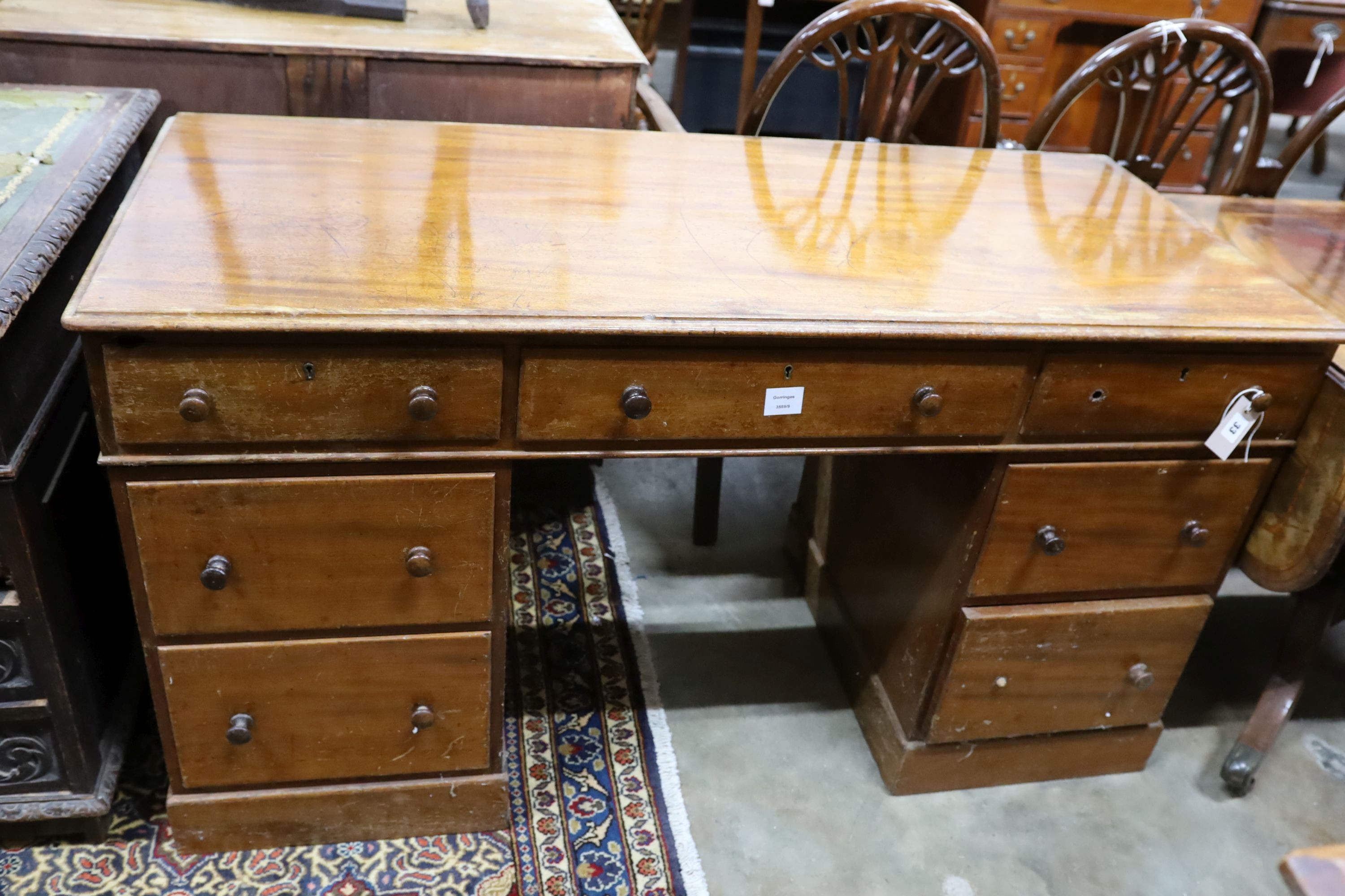 A Victorian mahogany pedestal desk, length 136cm, depth 58cm, height 76cm